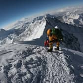 Photo taken on May 17, 2018, as mountaineers make their way to the summit of Mount Everest, as they ascend on the south face from Nepal. Photo by PHUNJO LAMA/AFP via Getty Images