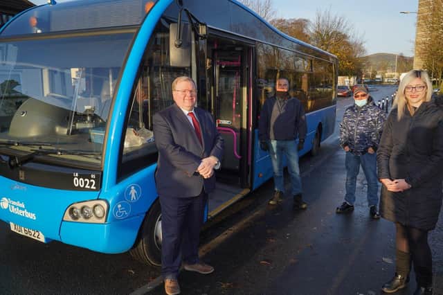 Councillor Jonathan Craig, Tommy Jackson, Joe Moore (both Seymour Hill residents) and Victoria Moore, Ulsterbus acting service delivery manager, Translink