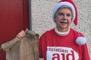 Retired teacher Iris Black from Cookstown holds up her Christmas sandbag stocking to raise awareness of the hunger crisis in flood-hit South Sudan, where around 2.4 million people are at risk of falling into famine. The worst flooding in nearly 60 years killed livestock and destroyed crops, worsening the country’s current hunger crisis.