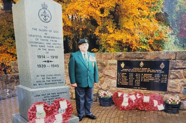 The late Thomas William (Tommy) Walker pictured at Loughgall War Memorial during one of the many Remembrance Sunday Parades which he had organised down through the years.