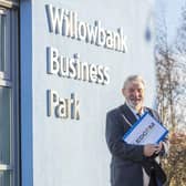 Dr Norman Apsley OBE, chairman (left) and Ken Nelson MBE, chief executive, outside Ledcom’s premises at Willowbank Business Park in Larne.