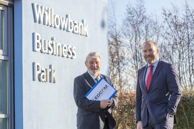 Dr Norman Apsley OBE, chairman (left) and Ken Nelson MBE, chief executive, outside Ledcom’s premises at Willowbank Business Park in Larne.