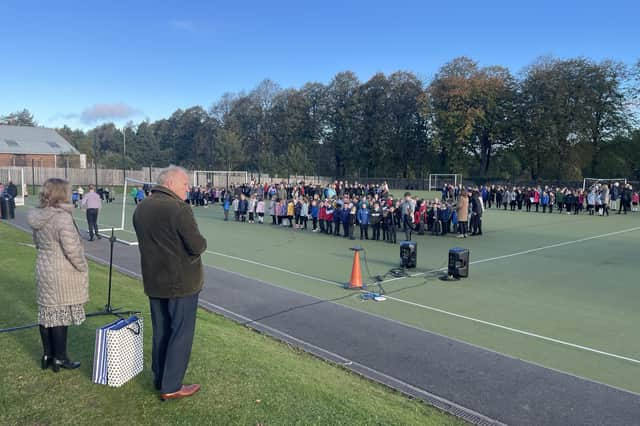 Terry Shields addresses King's Park Primary School at an outdoor assembly to mark his retirement