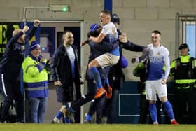 Matthew Snoddy embraces manager Gary Hamilton following his late winner for Glenavon