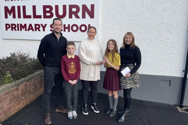 Ruairi McLean, Yasmin Geddis, Sharon Lamont and pupils from Millburn Primary School