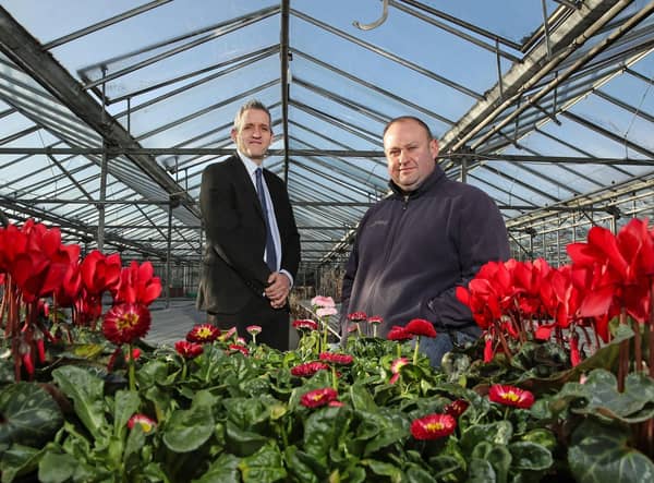 Ulster Bank business development manager Paul Reid (left) pictured with Wilderness Flower & Garden Centre owner Kyle Archer.