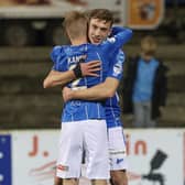 Matthew Shevlin celebrates with Lyndon Kane