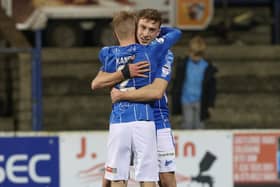 Matthew Shevlin celebrates with Lyndon Kane