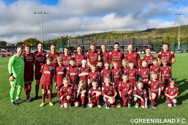 Greenisland players and mascots pictured ahead of their recent Irish Cup match against Lisburn Distillery. (Pic Ephy McConnell).
