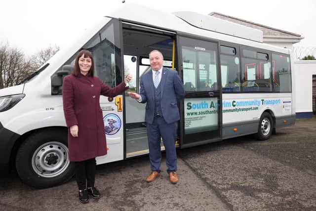 Minister Mallon pictured with Tom McCarthy, Manager of South Antrim Community Transport.
