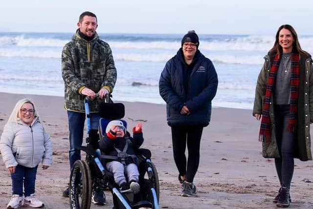 Jane, Gordy and Archie (age 6) Stewart joined Pippa Campbell from the Mae Murray Foundation and Anna Corry from Blossoming Birds to launch a fundraising campaign to help make Portstewart an Inclusive Beach time in for the new 2022 season.