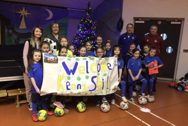 The Northern Ireland manager was welcomed to Abbots Cross Primary.