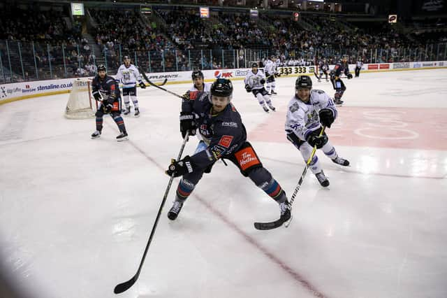 Belfast Giants’ Ben Lake with Manchester Storm’s Jared Vanwormer during an Elite Ice Hockey League game at the SSE Arena in Belfast