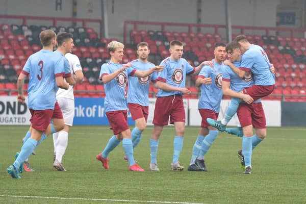 Defender Joel Bradley Walsh celebrates after giving Institute the lead. Picture by George Sweeney.