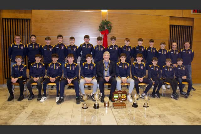 All-Ireland Féile champions from Glenariffe Oisins pictured at Cloonavin with the Mayor of Causeway Coast and Glens Borough Council Councillor Richard Holmes who hosted a reception in recognition of their success