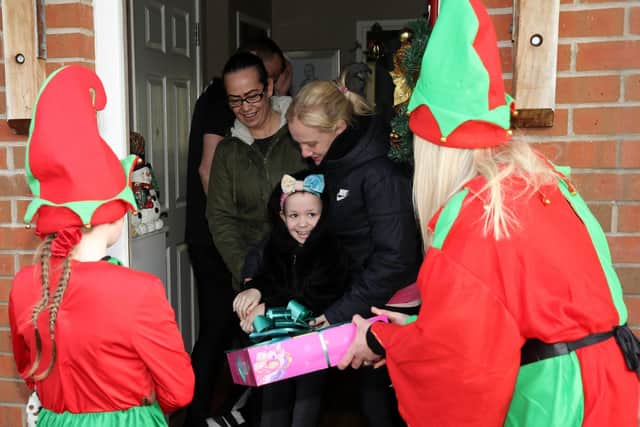 NI Children to Lapland elves making a special delivery to Kristen Thompson.
