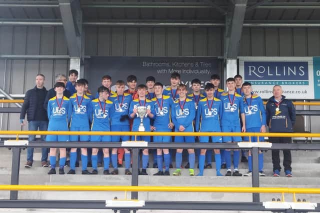 Carryduff Colts winning squad with Under-18 cup