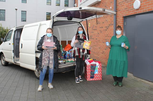 SERC SU Foodbank Donations Ready for Delivery to Lisburn Foodbank: Libby Jones, Class Rep for Level 3 Extended Diploma in Sports, Gemma Diamond, Student Governor and Karina Jones, Student Engagement Intern.