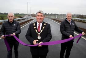 Chief Executive of The Lotus Group, Ciaran Murdock and Managing Director of Lotus Homes, Paul O’Rourke, are joined by the Mayor of Antrim and Newtownabbey, Cllr Billy Webb, to officially open the first phase of the  Ballyclare Western Relief Road.