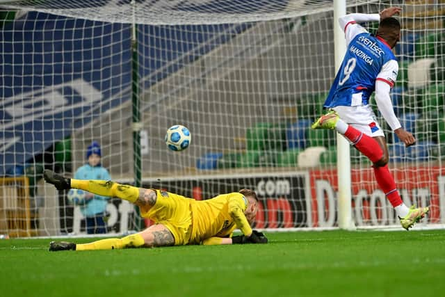 Christy Manzinga grabs the game's only goal as Linfield defeat Ballymena United to move back on top of the Danske Bank Premiership table. Pic by PressEye Ltd.