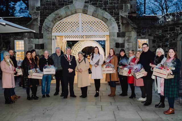 The Mayor of Antrim and Newtownabbey, Cllr Billy Webb and Mayoress Mrs Pat Webb witht he winners of The Spirit of Christmas Awards.
