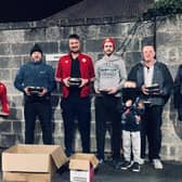 Portadown manager Matthew Tipton (left) with supporters during the club's meal delivery project to the elderly and The Simon Community. Pic courtesy of Portadown FC.