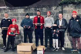 Portadown manager Matthew Tipton (left) with supporters during the club's meal delivery project to the elderly and The Simon Community. Pic courtesy of Portadown FC.