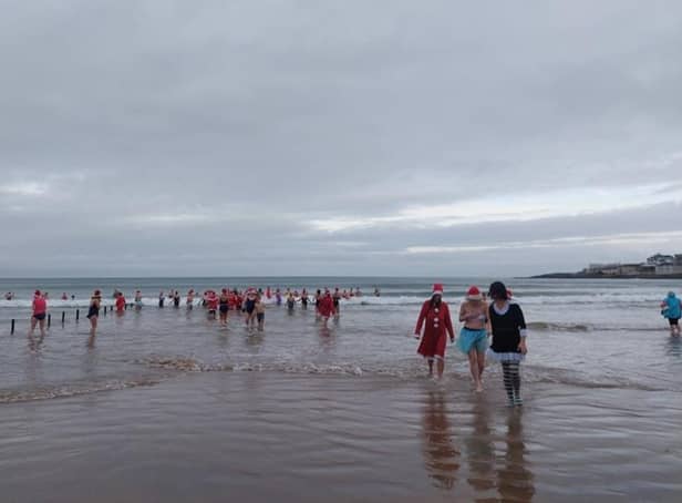 The Seabirds' Christmas Eve dip in aid of the Olive Branch attracted great support