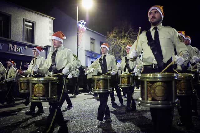 Bandsmen from Kilcluney Volunteers Flute Band taking part in a Christmas themed procession through Markethill. Photo by Kelvin Boyes / Press Eye.