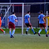 Institute goalkeeper John Connolly punches the air as he celebrates keeping out Newry City’s Daniel Hughes’ second half penalty. Picture by George Sweeney