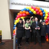 Pictured holding the award is Mark Cribbin, Account Director for Aramark Ireland and licensee of Maxol A26 Tannaghmore as Kevin Paterson, NI Regional Manager for Maxol (front right) presented vouchers to the staff of Maxol Service Station A26 Tannaghmore to celebrate and mark the important win.