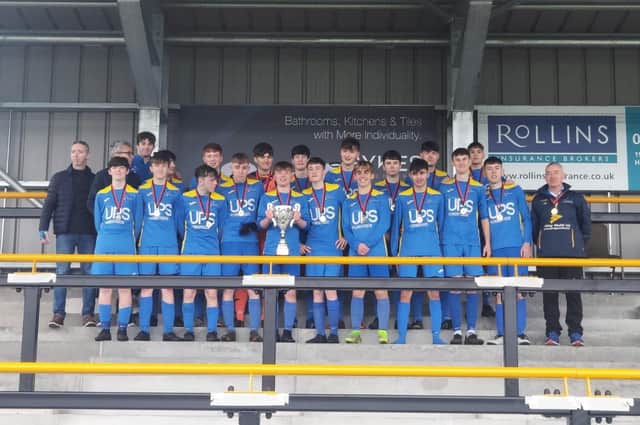 Carryduff Colts winning squad with Under-18 cup