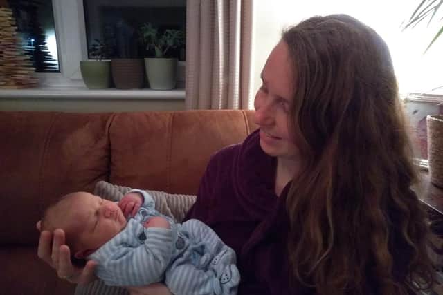 Portadown woman Heleen Hammond, formerly from Holland, with her New Year's Day baby Jonathan Pieter-Jan Hammond.