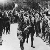 1929:  Adolf Hitler (1889 - 1945), leader of the German National Socialist Party, during a visit to Munich.  (Photo by Hulton Archive/Getty Images)