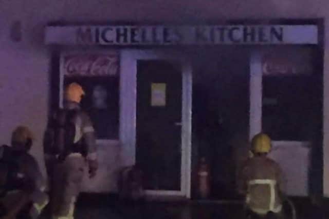 Firefighters tackle a blaze at Michelle's Kitchen, Tullygally Shops, Craigavon.