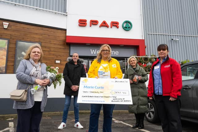 SPAR Greystone donating their cheque to Marie Curie in Bernard’s memory. (Left to Right) Elaine Sheridan (Wife), Michael Sheridan (Son), Heather Miller (Marie Curie), Claire Sheridan (Daughter) and Diane Camlin (Assistant Manager)