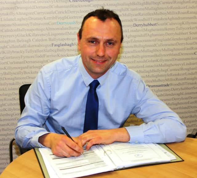 Keith Buchanan DUP candidate for Torrent signing his nomination papers ahead of the forthcoming elections