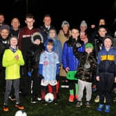 Players and coaches with ex-Northern Ireland international Mal Donaghy and Mayor Stephen Martin. Picture: Jonathan Irwin