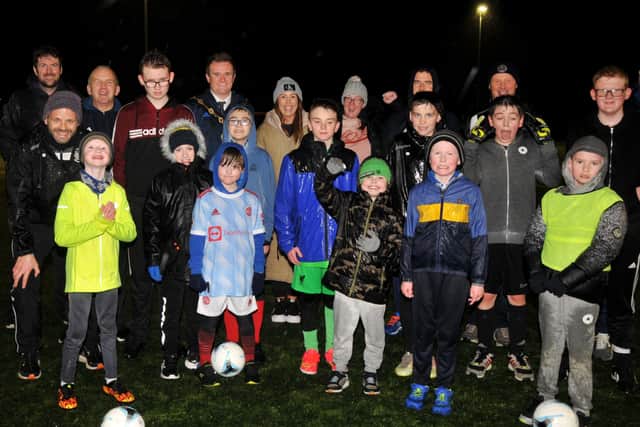 Players and coaches with ex-Northern Ireland international Mal Donaghy and Mayor Stephen Martin. Picture: Jonathan Irwin