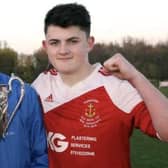 Sixteen-year-old Lee Bonis with Portadown BBOB manager Robert Love after scoring in the club's Foster Cup final victory. Pic courtesy of Portadown BBOB.