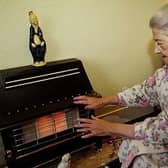 28/11/2001
AN ELDERLY LADY WARMS HERSELF BY HER GAS FIRE.  MANY OLDER PEOPLE ARE PREPARING THEMSELVES FOR THE ONSLAUGHT OF WINTER AND DROPPING TEMPERATURES.