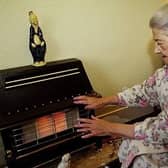 28/11/2001AN ELDERLY LADY WARMS HERSELF BY HER GAS FIRE.  MANY OLDER PEOPLE ARE PREPARING THEMSELVES FOR THE ONSLAUGHT OF WINTER AND DROPPING TEMPERATURES.
