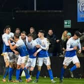 Glenavon players celebrate Matthew Fitzpatrick's late equaliser