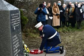 Paying respects those killed at Teebane 30 years ago.














Picture: Colm Lenaghan/ Pacemaker