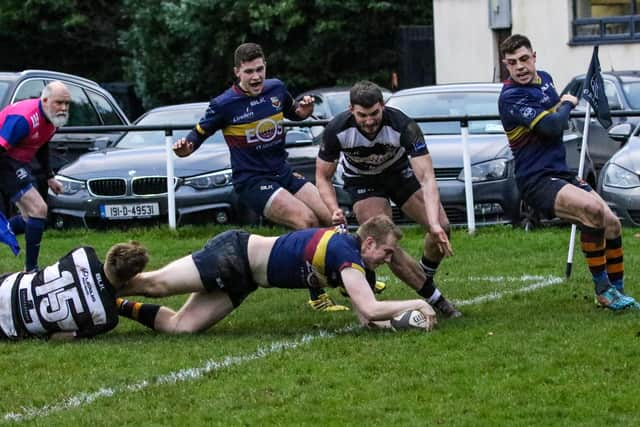 Andrew Morrison touches down for Bann's third try. Picture: John Mullan