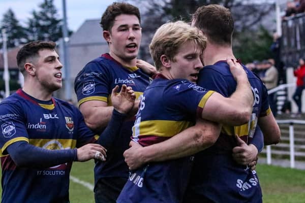 Robin Sinton congratulated by Adam Doherty, Cavid McCann and Rob Lyttle during Banbridge's 22-31 victory over Old Belvedere in the Division 1B of the Energia All-Ireland League. Picture: John Mullan