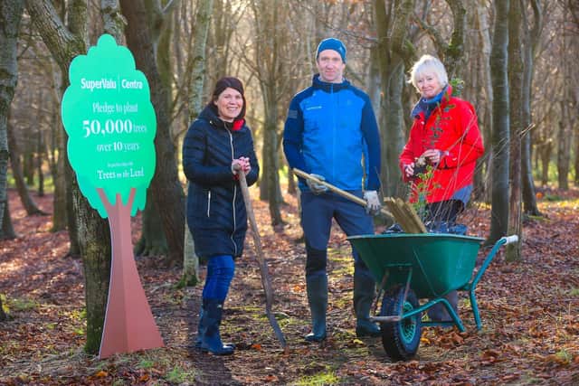 SuperValu and Centra Brand Communications Manager Carol Marshall (left) visits landowner Rosanna Ballentine and son Ian, whose farm will benefit from 500 native trees sponsored by the community retailers