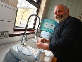 Seamus Rafferty first to be connected to gas network in Coalisland.