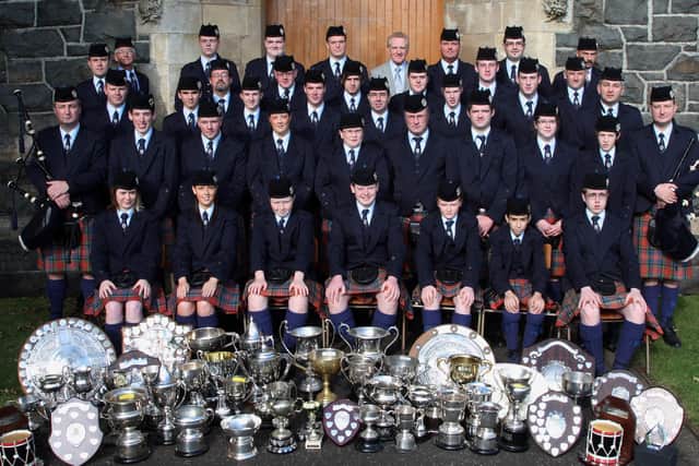 World Champions Cullybackey Pipe Band, who had their trophies on show in the village on Saturday as locals got a chance to view their vast array of silverware. BT42-127JC