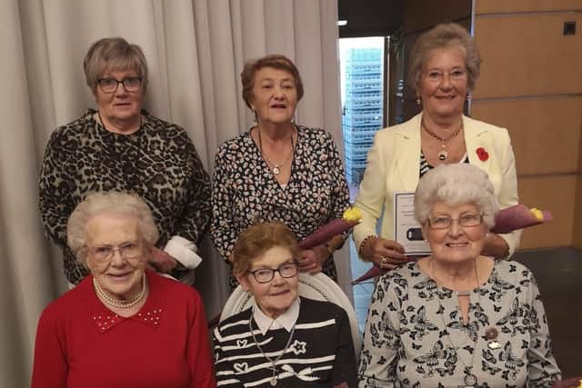 Six ladies from Kells &amp; Connor WI were made honorary members at the annual dinner in the Rosspark Hotel.  President Rosemary McAllister
presented five of those present with their honorary membership
together with a single yellow rose, symbolising 'friendship';.
Back L-R Rosemary McAllister (President), Margaret Erwin, Marjorie
McDowell (a founder member).  Front L-R  Margaret McKay, Margaret
McIlveen and Sally Harper. (Ruby McSeveney was unable to be present).
Congratulations to all of these long-standing members who have dedicated many years to the
Womens' Institute.